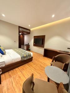 Katil atau katil-katil dalam bilik di The Olive Hotel Srinagar