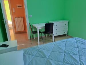 A bed or beds in a room at Appartamento Via Bixio
