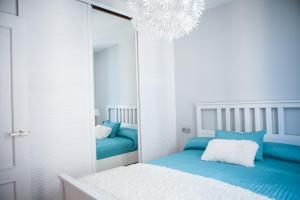 Posteľ alebo postele v izbe v ubytovaní Livemálaga Thyssen