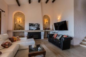 Χώρος καθιστικού στο Villa Tamariu con vistas al mar