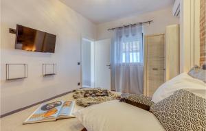 Postel nebo postele na pokoji v ubytování Villa La Vrana