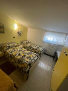 Postel nebo postele na pokoji v ubytování B&B Le Terrazze + 37 fotografií