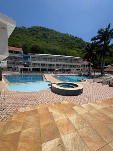 a resort with a large pool and a building at Montaña de Anapoima in Apulo +48 photos