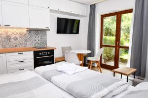 Postel nebo postele na pokoji v ubytování Studio Sumava-Bayerischer Wald