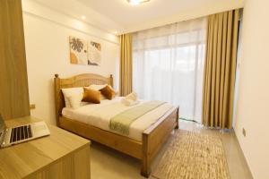 Flat in Lavington客房内的一张或多张床位