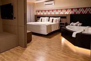 Cama ou camas em um quarto em Complexo Eco Cataratas Resort by SJ