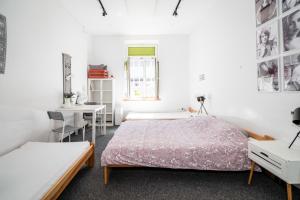 Posteľ alebo postele v izbe v ubytovaní Master Corner Apartment