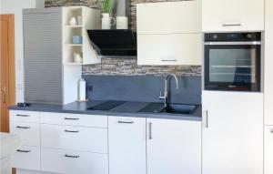 Kuchyň nebo kuchyňský kout v ubytování Ferienwohnung Mit Sauna