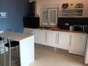 Кухня или мини-кухня в Apartmani Zoran
