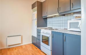Kuchyň nebo kuchyňský kout v ubytování Apartment Blåvandvej Blåvand Iv + 9 fotografií