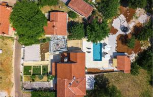 an overhead view of a house with a yard at Villa Stora Kuca in Krapan