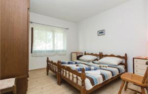 Posteľ alebo postele v izbe v ubytovaní Holiday Home Privlaka Put Grzanove Punte