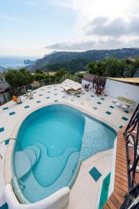 a swimming pool on top of a building at Villa MyHeart in Massa Lubrense
