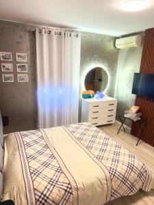 Postel nebo postele na pokoji v ubytování Pogradec Apartment