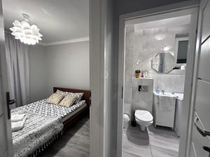 Postel nebo postele na pokoji v ubytování Centrum Pańska3 Apartment PARKING