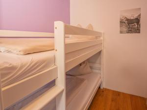A bed or beds in a room at Rosenberger II