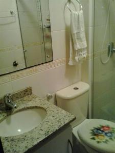 Koupelna v ubytování Apartamento Solar do Centro - Gramado RS
