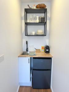 Kuchyň nebo kuchyňský kout v ubytování Torquay Boutique Guesthouse