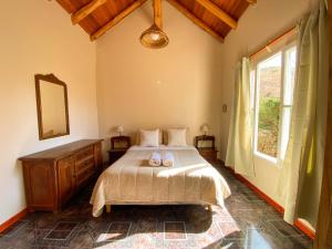 Ένα ή περισσότερα κρεβάτια σε δωμάτιο στο El Solar Casas de Campo 3 +26 φωτογραφίες