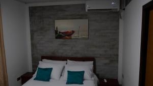 Ένα ή περισσότερα κρεβάτια σε δωμάτιο στο Hotel Boutique Damasco