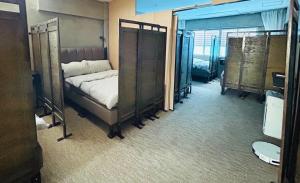 Ein Bett oder Betten in einem Zimmer der Unterkunft Nonoteru Chiangmai