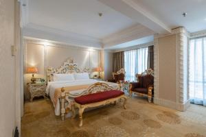 Postel nebo postele na pokoji v ubytování Nanyang King's Gate Hotel--Free Shuttle Service to Canton Fair + 37 fotografií