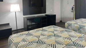 Postel nebo postele na pokoji v ubytování Motel 6 Dumas, TX