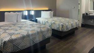 Postel nebo postele na pokoji v ubytování Motel 6 Dumas, TX