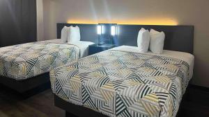 Postel nebo postele na pokoji v ubytování Motel 6 Dumas, TX