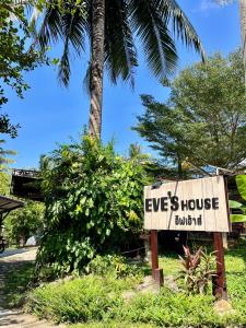 a sign that reads eyes house buddha at Eve house koh kood in Ko Kood