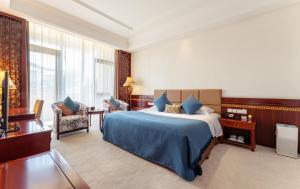 Postel nebo postele na pokoji v ubytování HeBei Cuipingshan Guest House