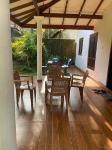 En terrasse eller udendørsområde på Hetti Villa