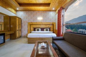Ένα ή περισσότερα κρεβάτια σε δωμάτιο στο Hotel Cherry Manali