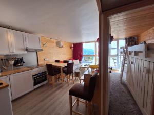 Η κουζίνα ή μικρή κουζίνα στο Appartement cosy 2 pièces 5 pers, balcon, Arc 1800 - FR-1-411-962