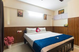 Katil atau katil-katil dalam bilik di Sancta Maria Airport Suites
