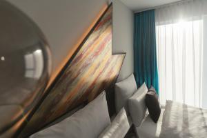 Μια τηλεόραση ή/και κέντρο ψυχαγωγίας στο Holiday Inn - the niu, Flash Berlin Charlottenburg by IHG