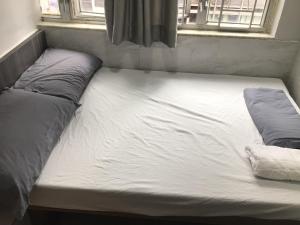Katil atau katil-katil dalam bilik di Ajit guest house