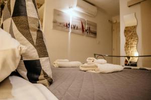Кровать или кровати в номере City Rooms Šibenik
