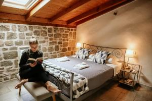 Кровать или кровати в номере City Rooms Šibenik