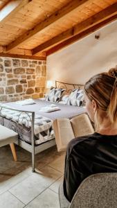 Кровать или кровати в номере City Rooms Šibenik