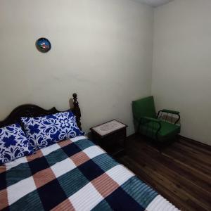 Postel nebo postele na pokoji v ubytování Conexión Urbana en el centro de Ambato