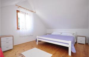 Posteľ alebo postele v izbe v ubytovaní Holiday Home Ducac