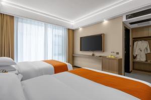 Postel nebo postele na pokoji v ubytování So Easy Hotel