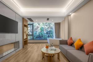 TV a/nebo společenská místnost v ubytování So Easy Hotel