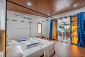 Кровать или кровати в номере Sea Star Resort
