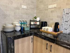 Køkken eller tekøkken på Rumah Saujana KLIA