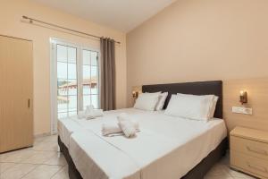 Voodi või voodid majutusasutuse Yakinthos Hotel toas