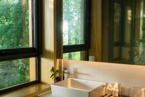 Foto sihtkohas Huangshan asuva majutusasutuse Wangshan Life Diaoxueyuan Design Hotel galeriist +37 fotot