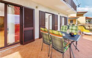 Balkón nebo terasa v ubytování Pet Friendly Apartment In Pobri + 22 fotografií