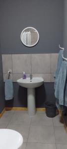 O baie la Green Leaf Cottage in Jeffreys Bay